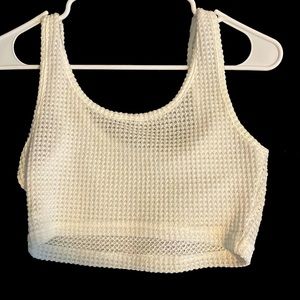 A bathing suit top cover. It’s light weight, it’s super cute and trendy.